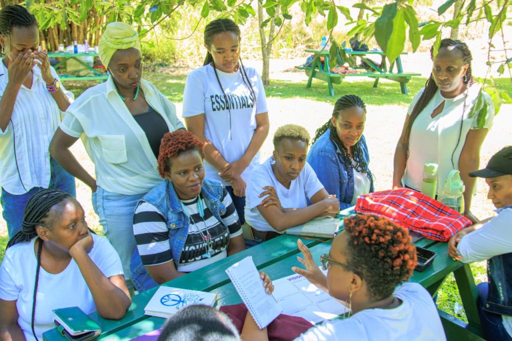 A group of Wired tribe women in a group discussion with Pastor Wanjugu.